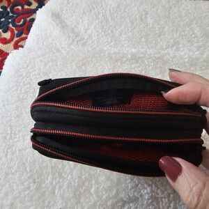 Sleek Black and Red Men's Travel Pouch